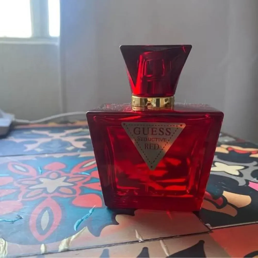 2.5 ounce bottle of Guess Seductive Red EDP